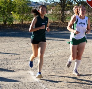Senior Natalia Huang concluded her second year of running for the varsity squad. She is one the toughest competitors on the course -- Photo by Eva Tseng