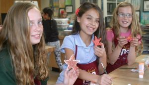 Students created star fish to adorn the virtual float created as part of this year's Rose Bowl parade celebration -- Photo by Patty Campbell