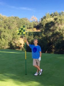 Kaden stands at the third hole at the Ojai Valley Inn, where he sank his hole-in-one -- Photo by Kase Skillern