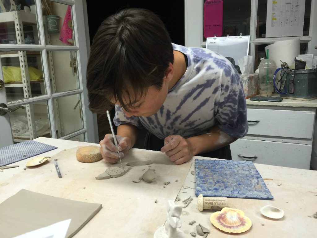 Sohomore Wendy Lazo-Dowdy creates ceramic work to be sold at the OVS booth for Ojai Day -- Photo by Evelyn Brokering