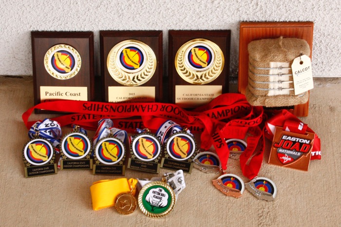 A sampling of the awards Miles has won since taking up archery four years ago -- Photo by Evelyn Brokering