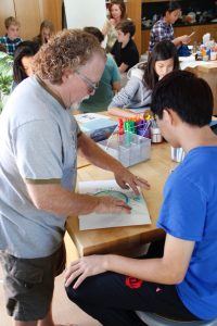 Guest artist Chuck Burright provided expert instruction on clock making to Lower students -- Photo by Misty Volaski