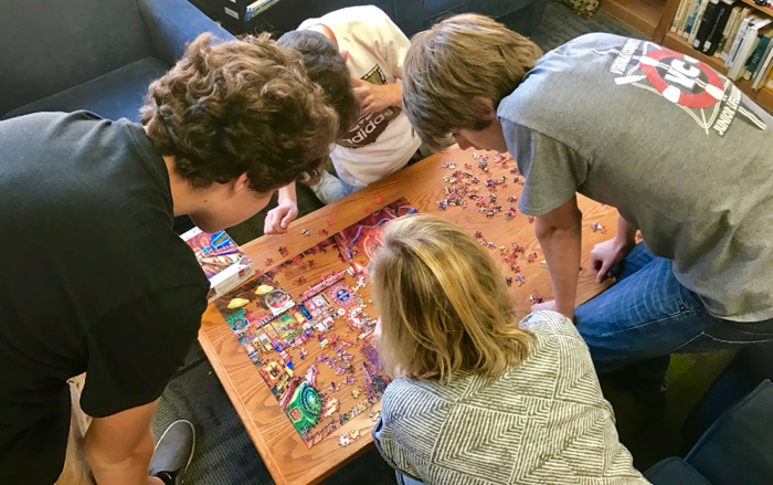 Members of the OVS Puzzle Club work with club advisor Ashlee Nishiya on the latest offering -- Photo by Fred Alvarez